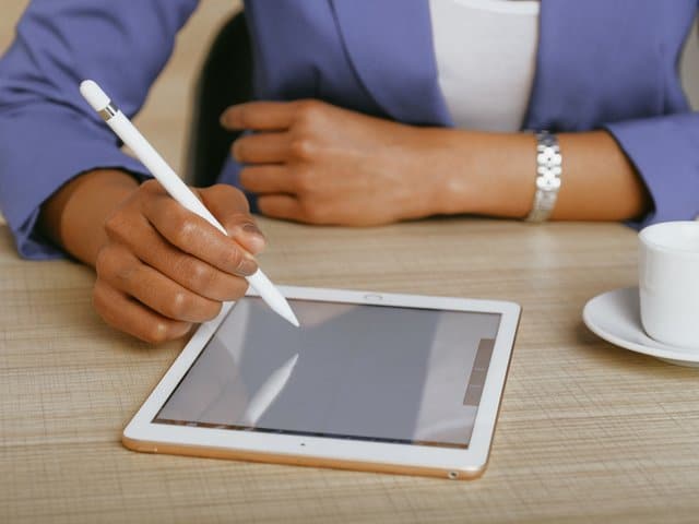 Digital tablet with stylus used for creative food art design at Bangkok Stay restaurant.